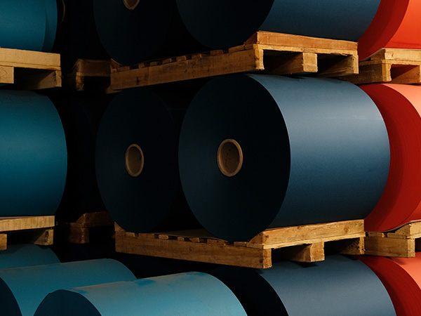 Blue and orange paper rolls