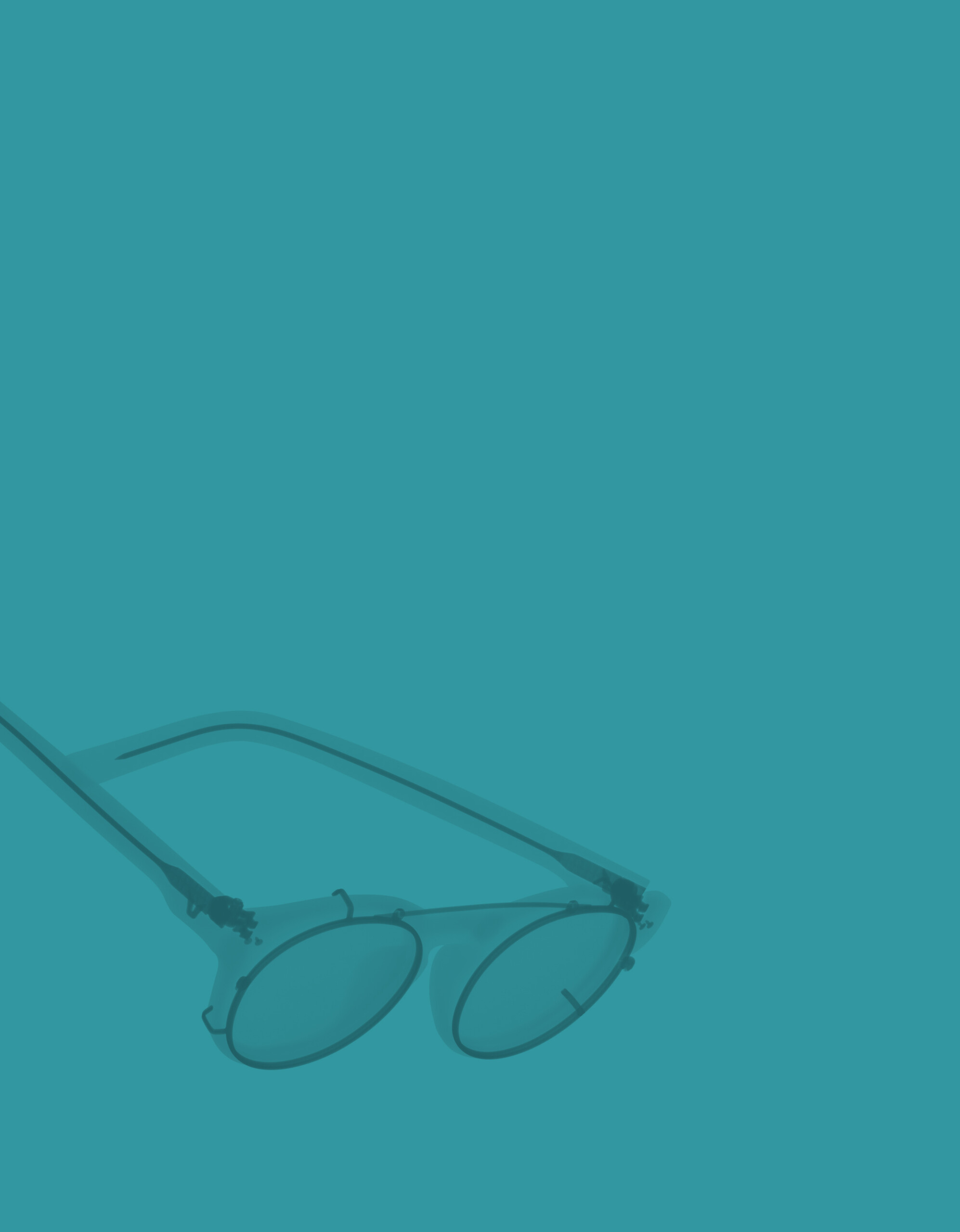 Brille auf türkisem Hintergrund